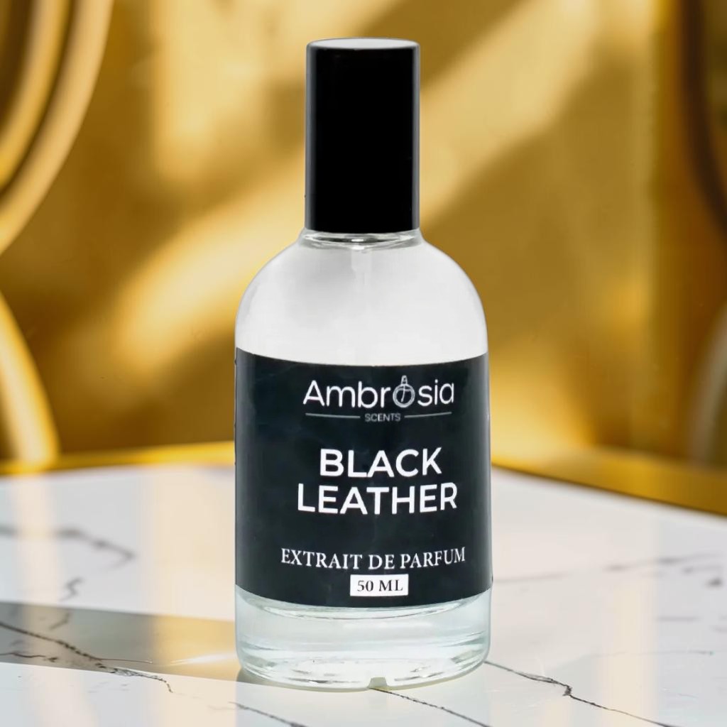 Ambrosia Scents Black Leather Extrait De Parfum 50ml bottle with black cap, featuring notes of leather, violet leaf, cardamom, jasmine, moss, and patchouli.
