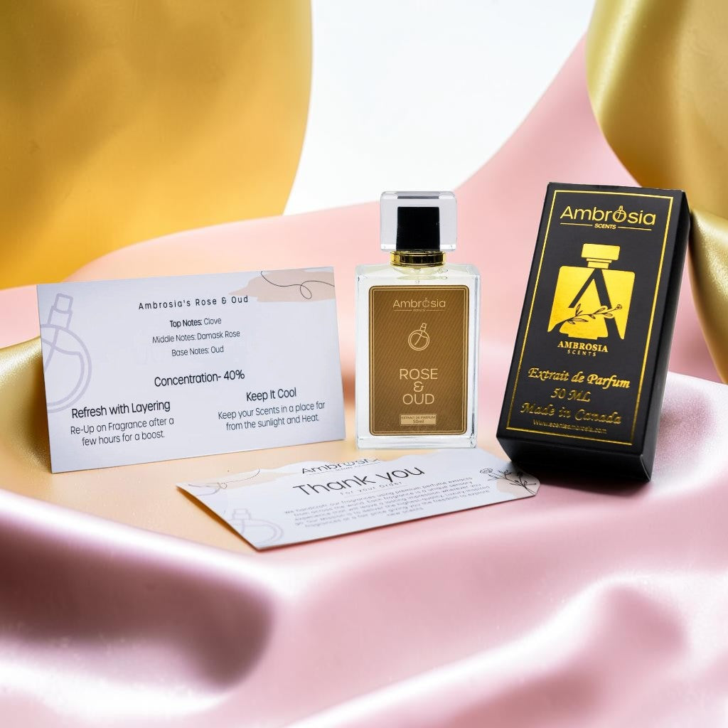 Ambrosia Scents Rose & Oud Extrait De Parfum 50ml bottle with black and gold packaging. Notes of clove, Damask rose, and oud.